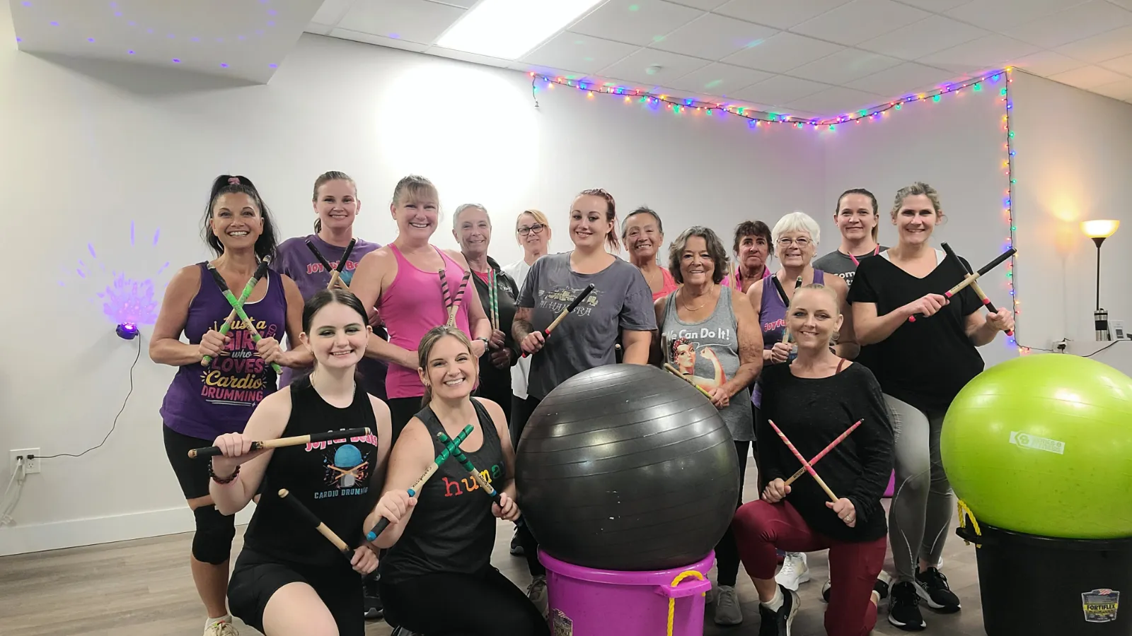The class posing together after a workout